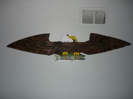 Custom Made Chainsaw Carved Relief Carving Of An Eagle Holding A Fish