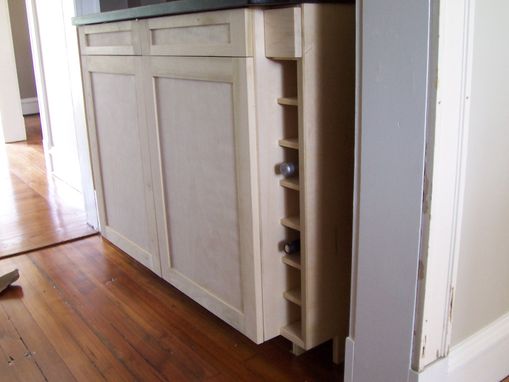 Custom Made Wet Bar Cabinet With Built-In Wine Storage.
