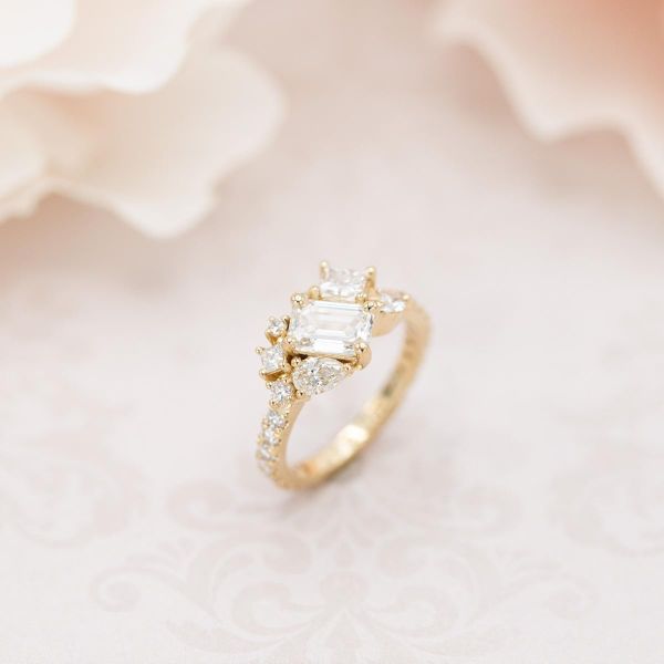 Controlled, beautifully architectural chaos in this ring's cluster arrangement of diamonds in varied shapes and sizes.