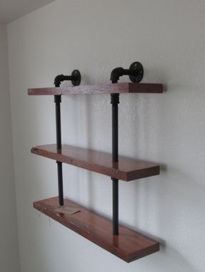 Custom Made Reclaimed Wood And Pipe Shelving Unit.