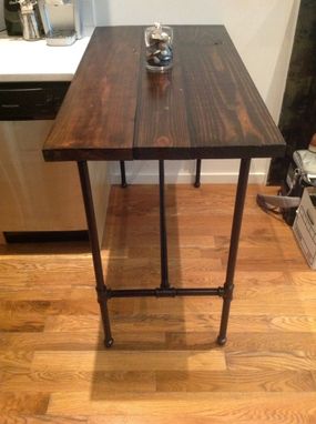 Custom Made Reclaimed Wood And Black Iron Pipe Table