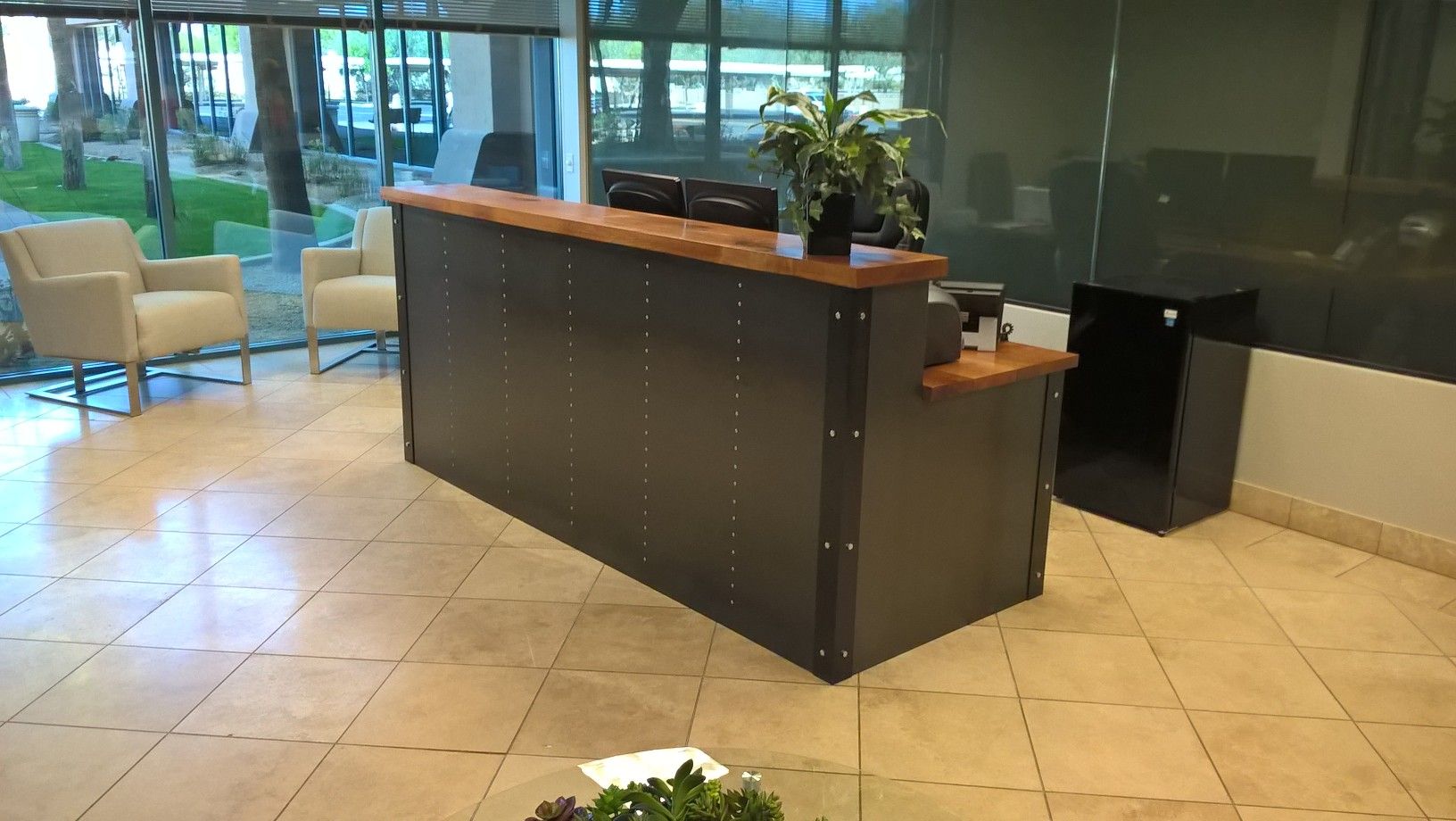 Buy Custom Industrial Reception Desk, made to order from Artfully Rogue
