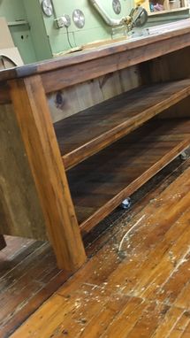 Custom Made Reclaimed Kitchen Island With Open Shelving And Wood Top