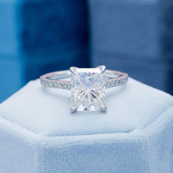 Simple yet sophisticated is the name of the game for this solitaire moissanite engagement ring.