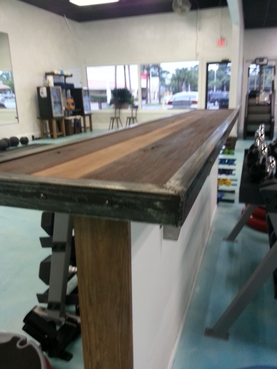 Custom Bar Top Made From Reclaimed Black Walnut And Raw Steel. by RSG