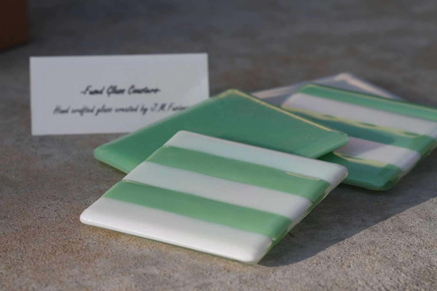 Hand Made White And Sea Green Glass Coasters In Set Of 4 by J.M