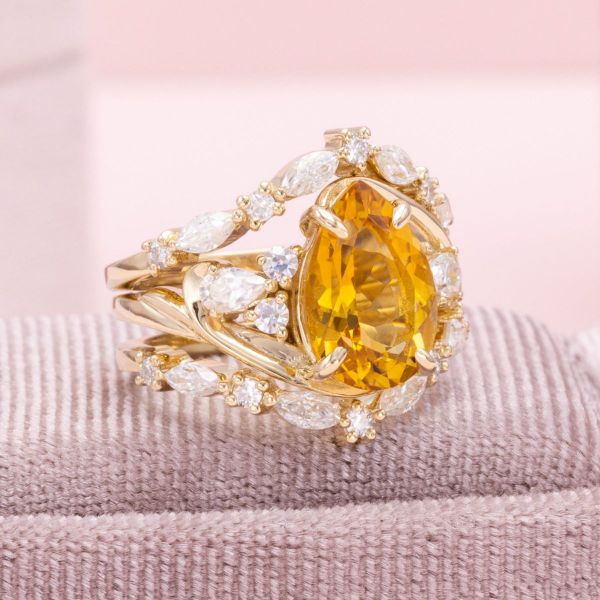 The autumn colors of this ring are made possible by the citrine and white moissanites sitting in the yellow gold setting.