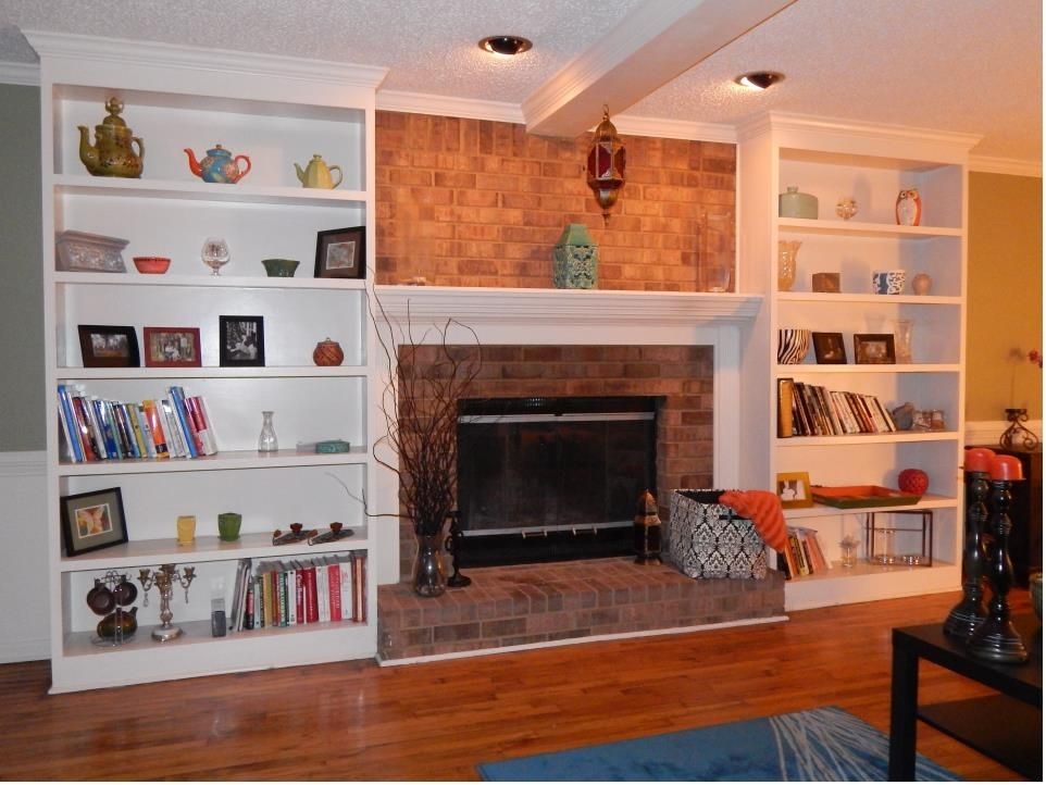 Custom Bookshelves Flanking A Fireplace by Atlanta Bookshelves