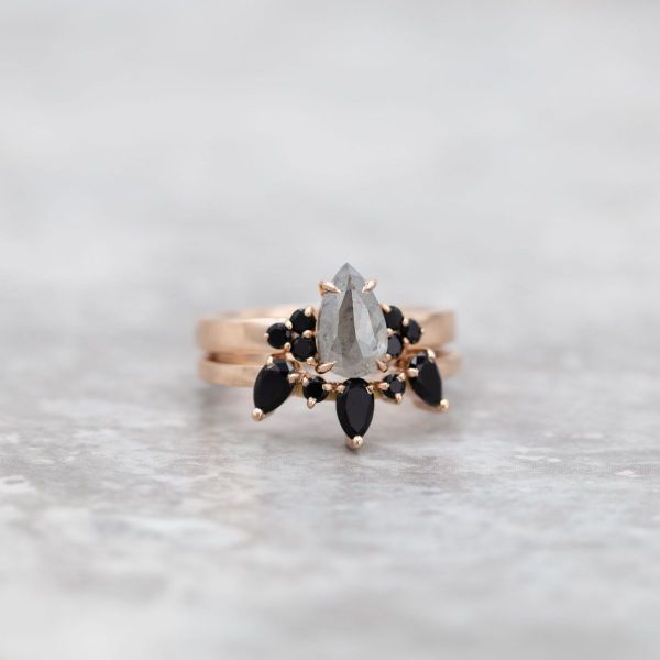 This cloudy gray salt and pepper diamond has slightly darker gray inclusions for a storm cloud feel.