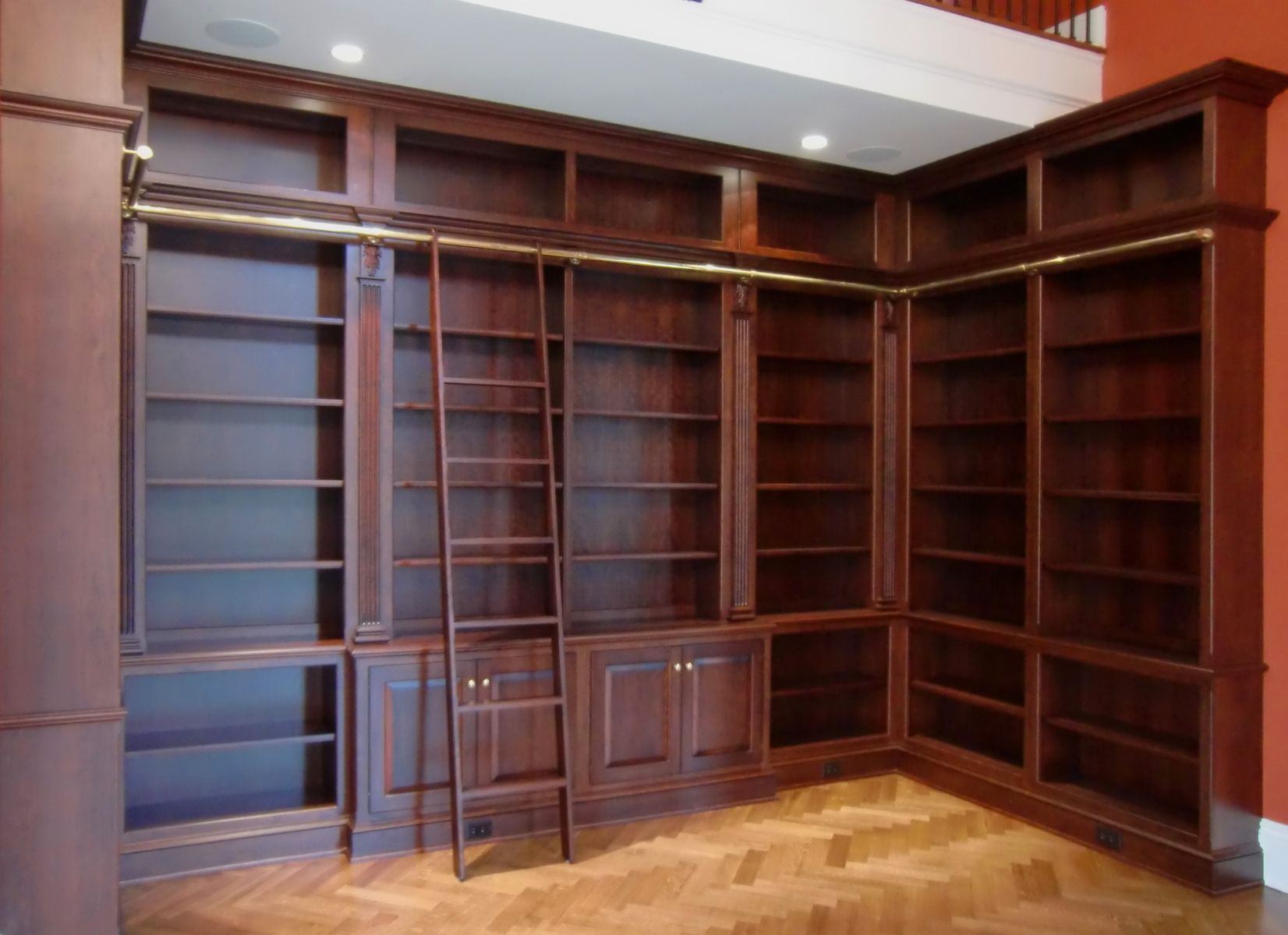 Library bookcase with clearance ladder