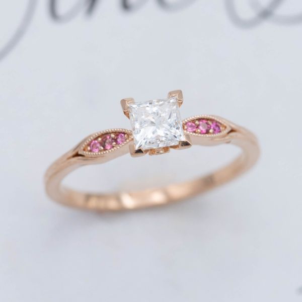 Delicate rose gold ring with princess cut diamond and pink tourmaline accents.