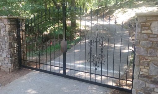 Custom Made Affordable Iron Gates With Flair