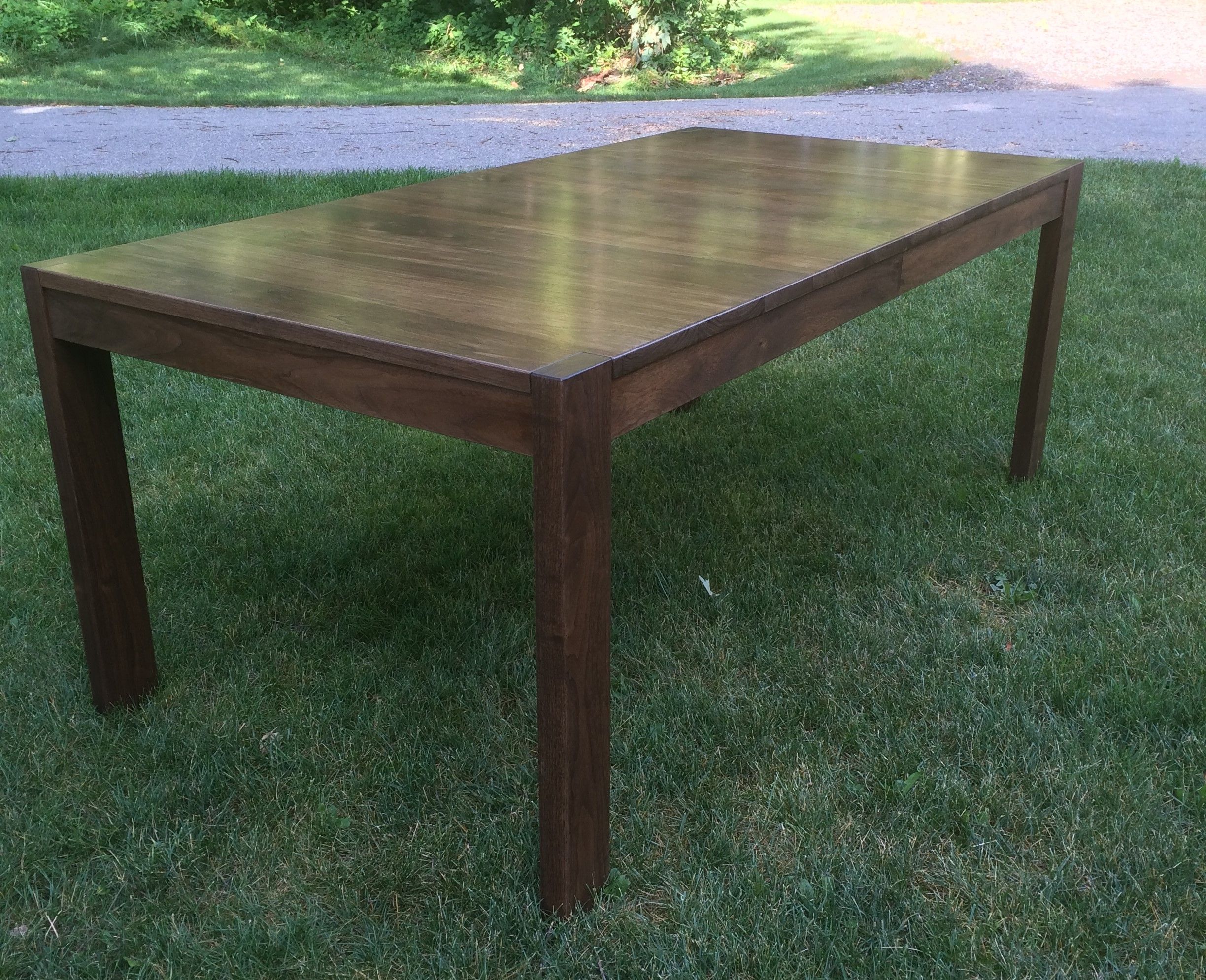 Hand Made Walnut Dining Table With Through Legs by Glessboards