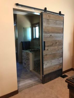 Custom Made Sliding Steel Barn Door With Reclaimed Wood Inlay