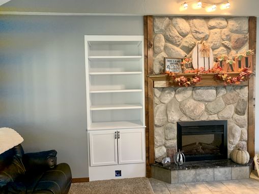 Custom Made Built-In Shelving And Base Cabinet With Doors