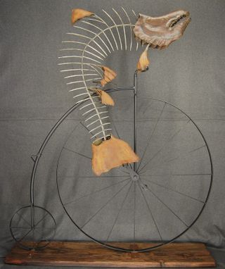 Custom Made Metal Fish On A Bike Sculpture