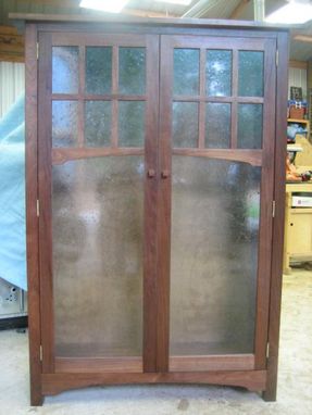 Custom Made Walnut Book Case With Glass Panel Doors.