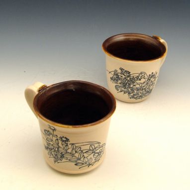 Custom Made Pair Of Pottery Coffee Mugs With Drawings Of Black Flowers