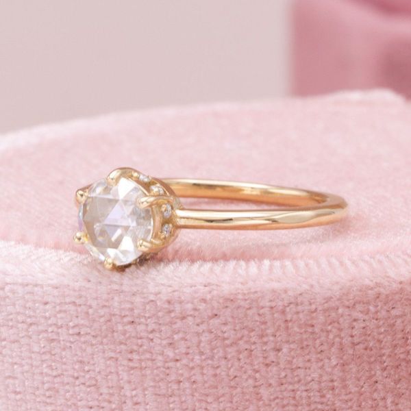 A rose cut moissanite center stone was the perfect choice for an engagement ring with a subdued sparkle.