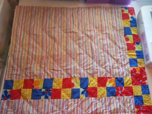 Custom Made Custom Red, Blue, Yellow Flowered Modern Baby Quilt