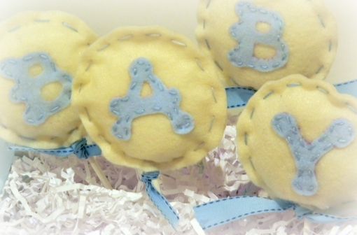 Custom Made Yellow And Blue Felt Lollipops For A Baby Boy