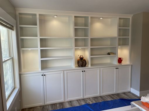 Custom Made Built-In Wall Shelving With Base Cabinet With Doors