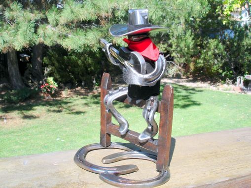 Custom Made Horseshoe Cowboy Sculpture.
