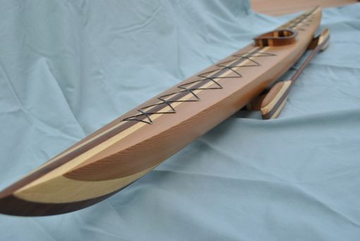 custom hand-carved kayak models by phil's woodwork