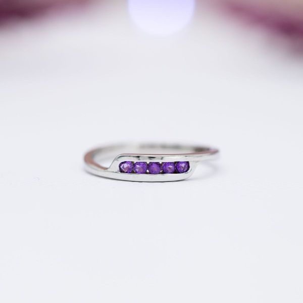 Practicality doesn’t mean boring, as proven by this striking white gold and channel-set amethyst ring.
