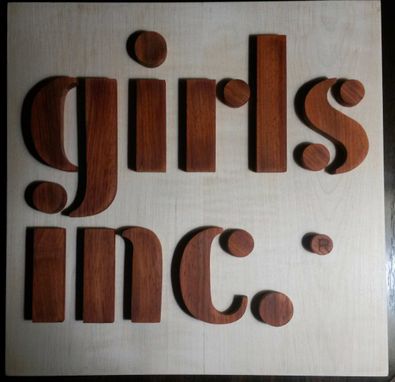 Custom Made Wood Girls Inc. Logo