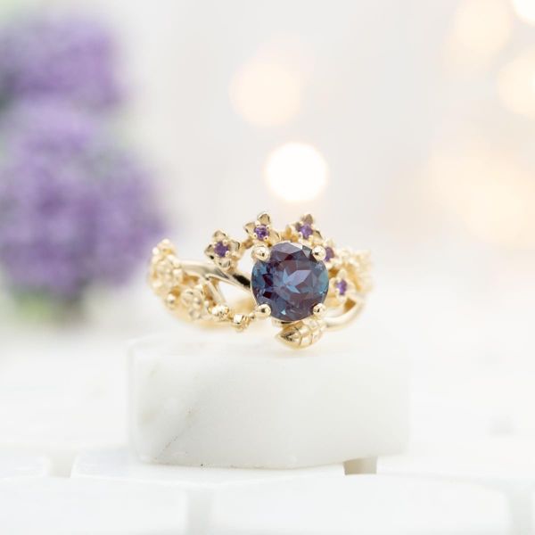 This lavender-inspired ring has a lab-created alexandrite set on a yellow gold band with amethyst accents.