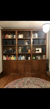 Custom Made Stained Oak Wall Shelving With Base Cabinets