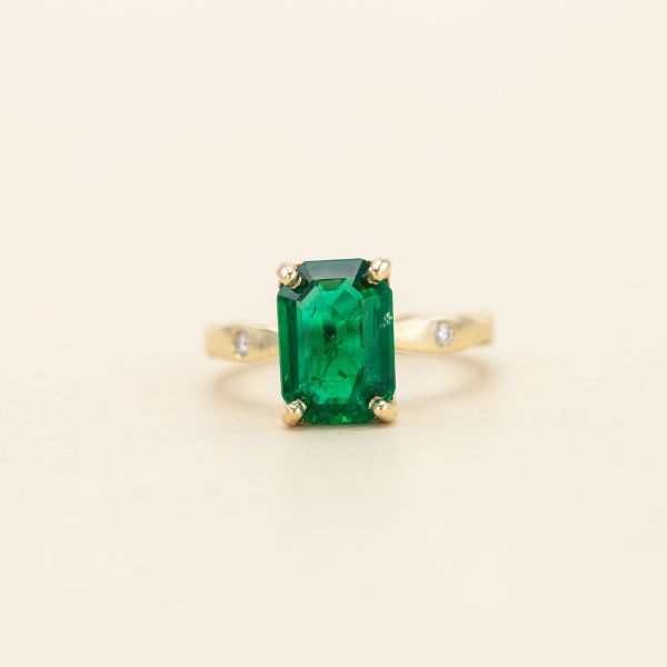 This natural emerald is untreated and shows hints of jardin veining throughout.