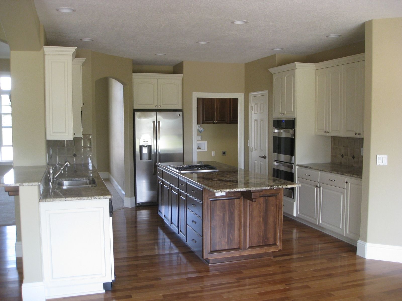 Custom Almond & Alder Kitchen by Sheridan Woodworking Llc