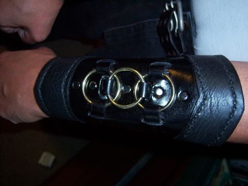 Custom Made Custom Black Three Brass Ring Bracers