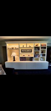 Custom Made Custom Library Shelving With Base Cabinets In White