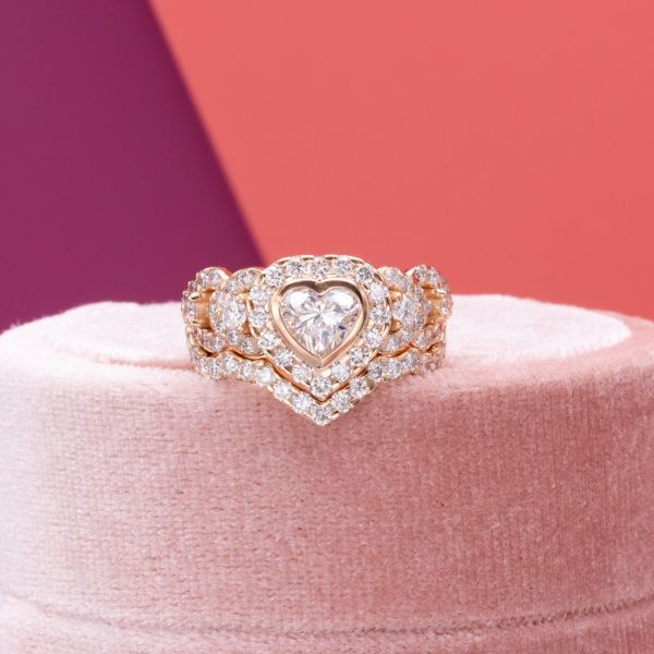 Last guess! The heart shaped diamond in the center of this engagement ring is lab created.