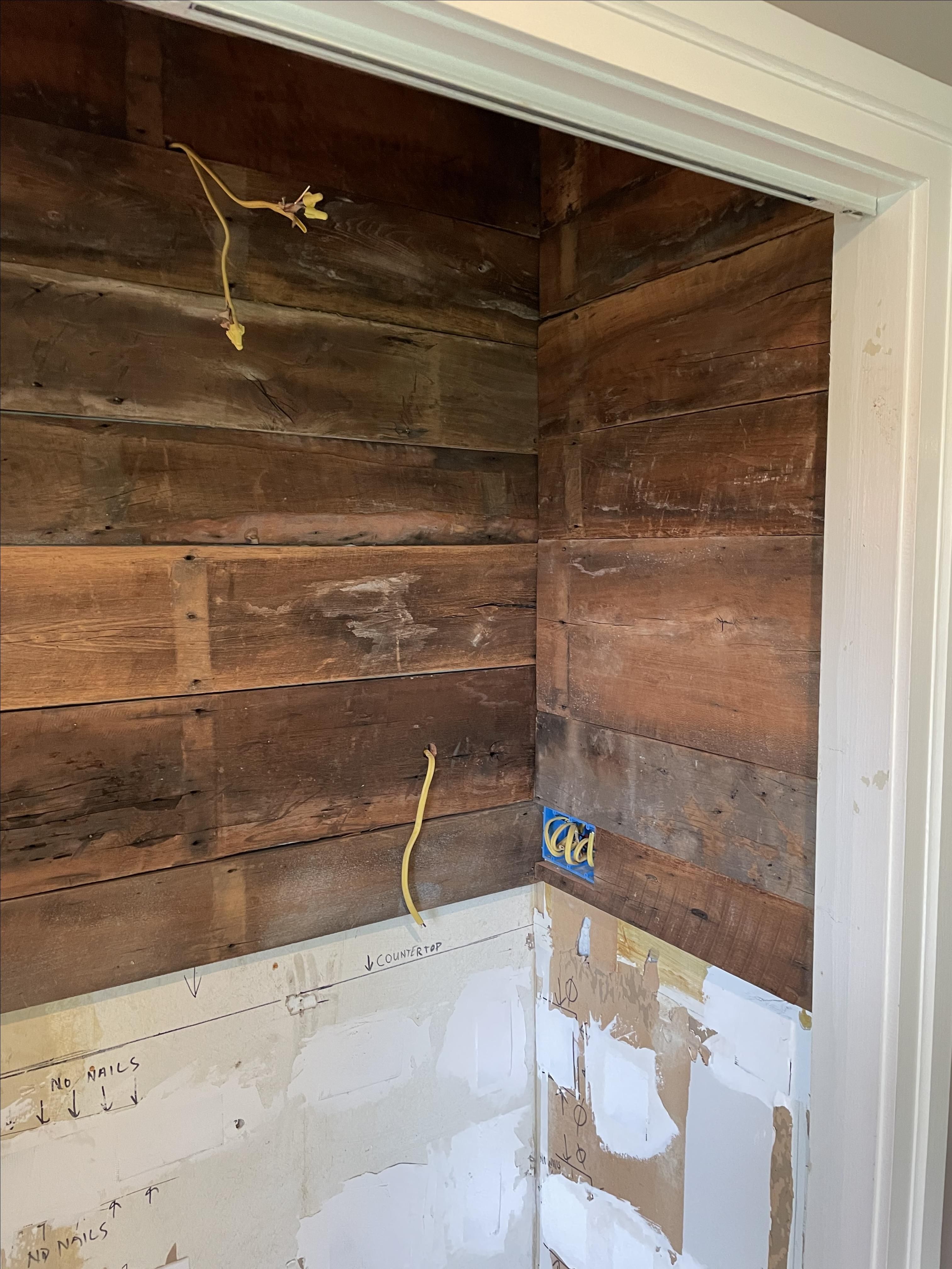 Custom Made Dry Bar With Barn Wood Wall Paneling by The Plane Edge, LLC
