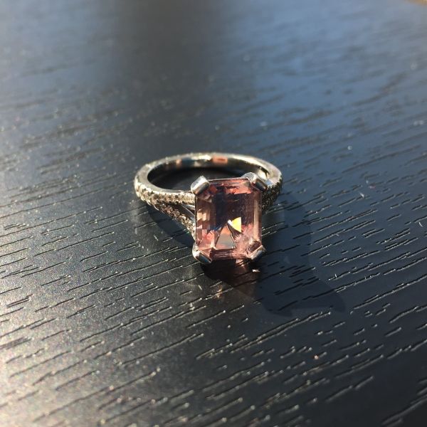 After a quick cleaning, the morganite looks much brighter and sparkles beautifully.