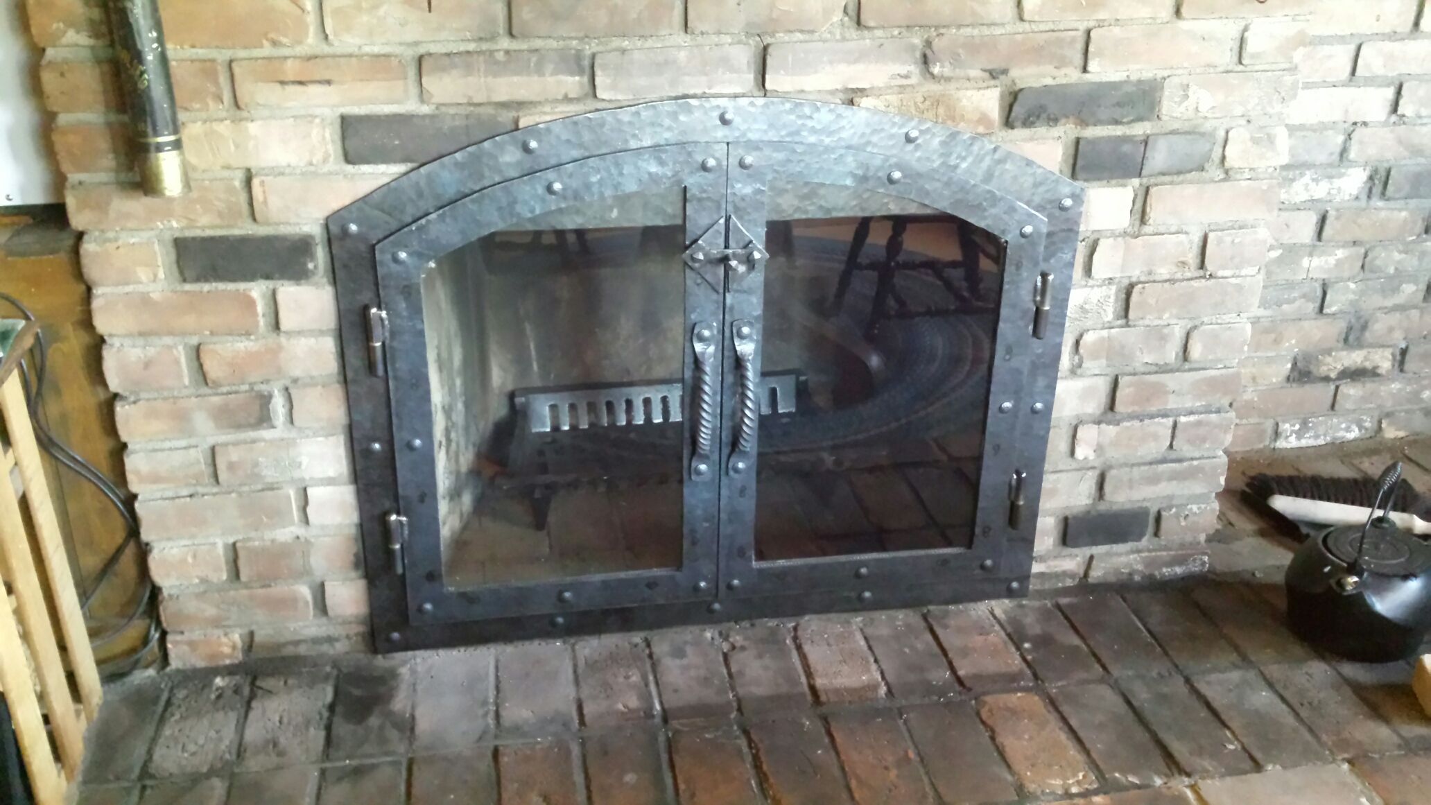 Handmade Custom Hammered Iron Fireplace Doors Fireplace Screen Twisted Handle By Lazy K Metalworks Custommade Com