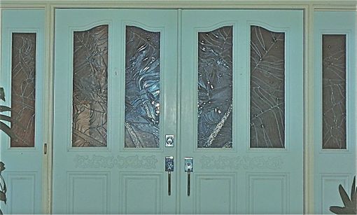 Custom Made Entryway Doors And Side Light Panels Featuring Textured Architectural Glass - Traveler's Palm Entry
