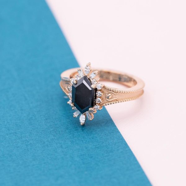 A black diamond hexagon is surrounded by diamond accents.