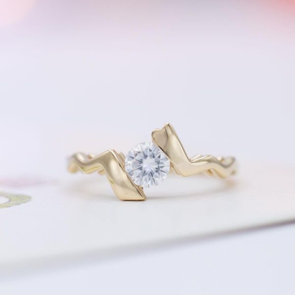 This tension setting makes the moissanite appear to be floating in the middle!