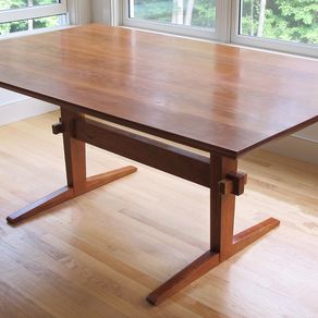 https://images.custommade.com/rFsarirJKnK2e7sZBSpFxvGMqpg=/292x292/custommade-photosets/3acf5027c0f33ea_cherry_trestle_leg_dining_table_top_view.jpg