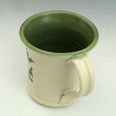 Custom Made Pottery Mug With Small Flowers In Black And Blue