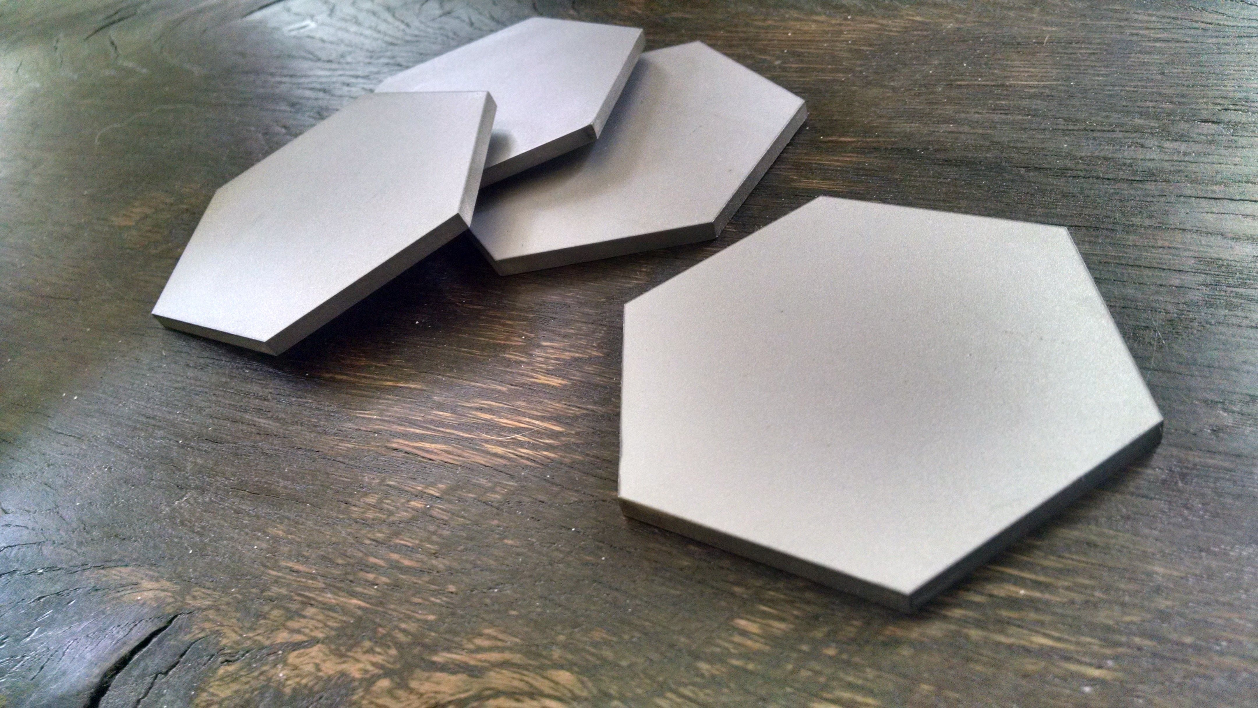 Buy Handmade Hexagonal Stainless Steel Coasters, made to order from Five Fork Studio