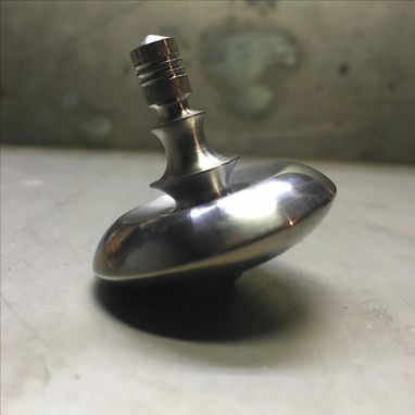 Custom Made 1.5" Diameter Iron And Titanium Spinning Top, Saucer Body
