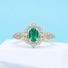 Custom emerald gemstone engagement ring