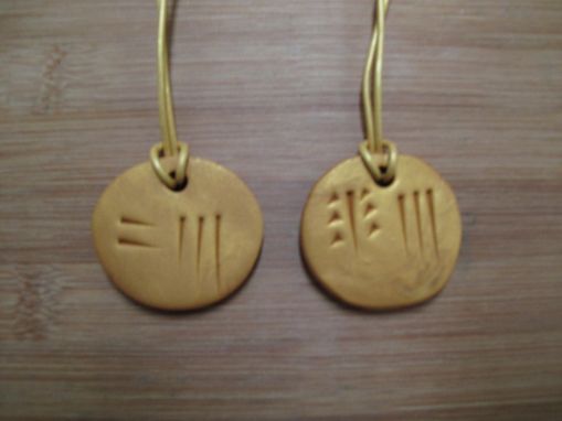Custom Made Cuneiform Pendents.