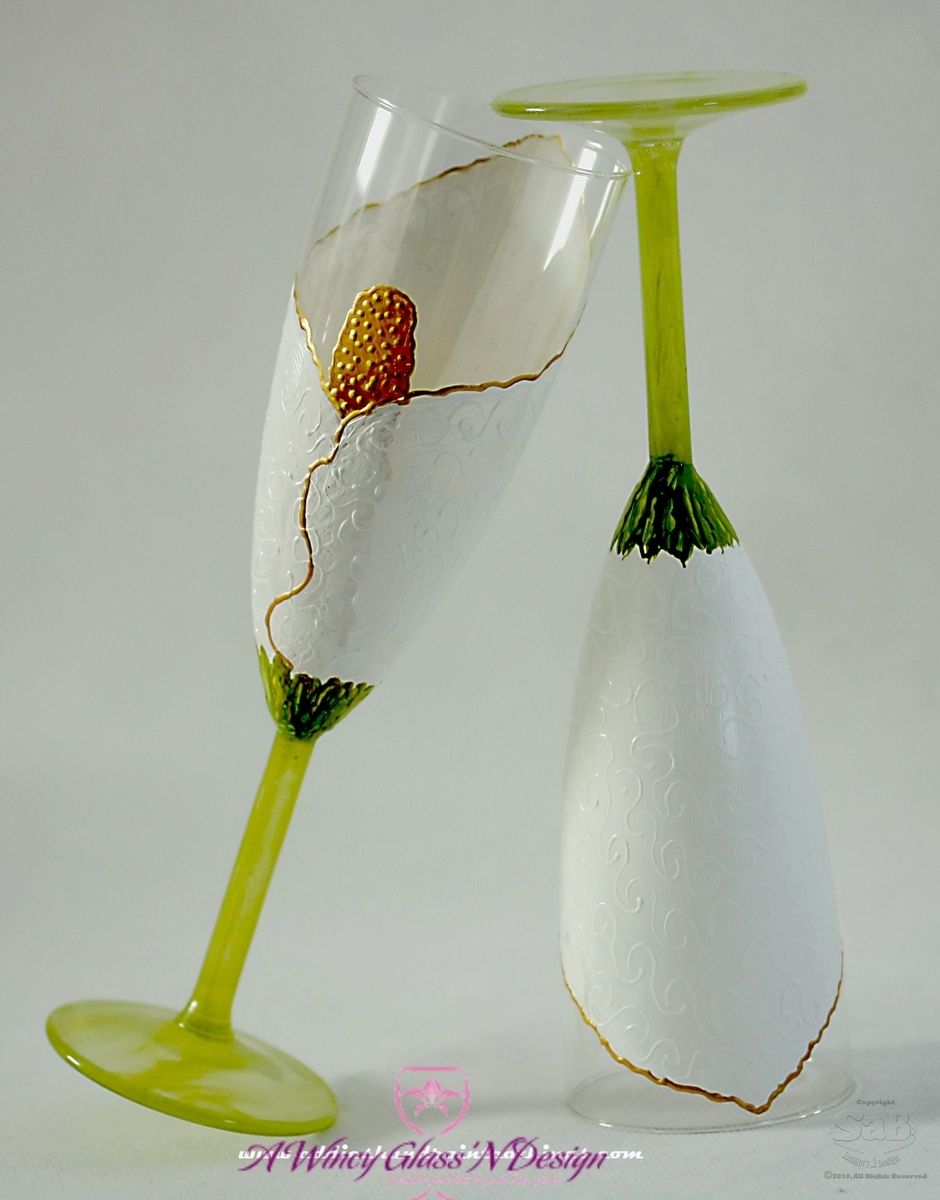 Bride And Groom With Calla Lily Bouquet Champagne Toasting Glasses Flutes